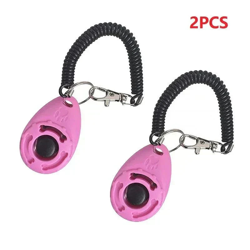 Clicker Dressage Premium pour chiens et chats, outil d'entraînement à cliquer avec bracelet réglable, design ergonomique et son précis, idéal pour renforcer les bons comportements.